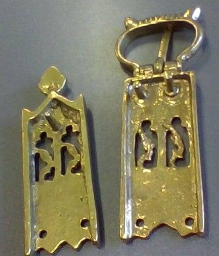 Medieval buckle with acorns and plants