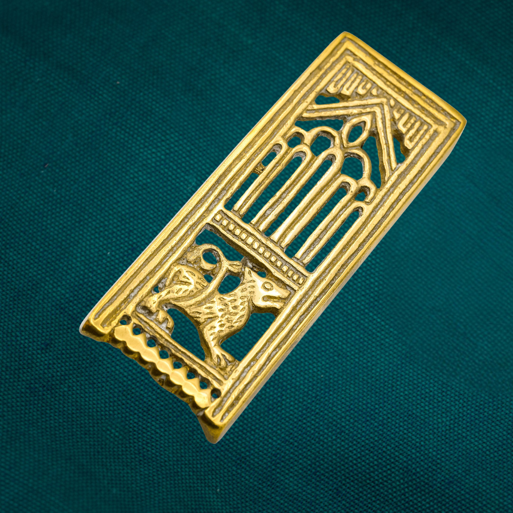 Medieval buckle with lion or wolf