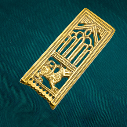 Medieval buckle with lion or wolf