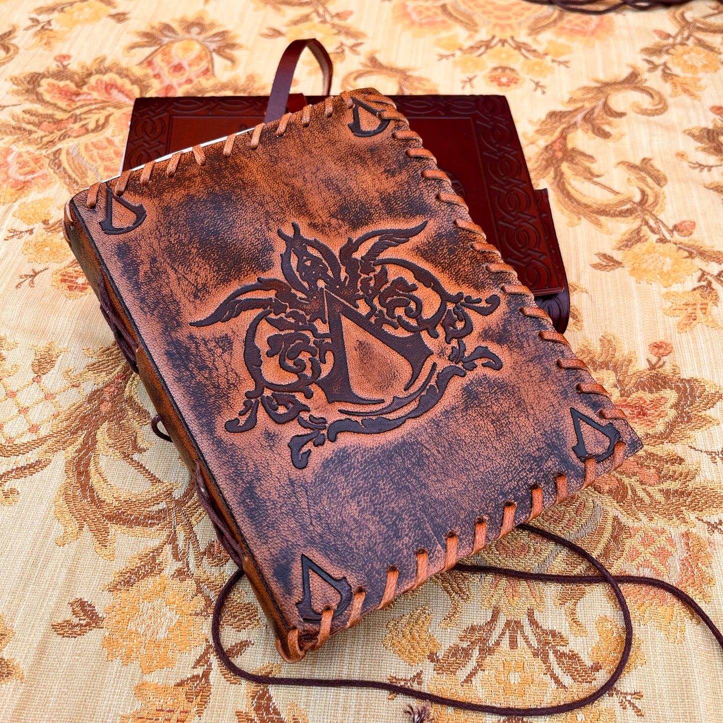 Leather Sketchbook with Embossed Assassin's Creed Design