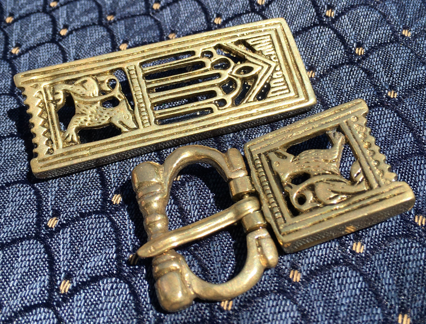 Medieval buckle with lion or wolf